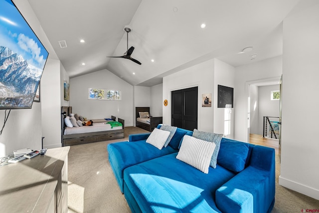 living room with carpet floors, lofted ceiling, visible vents, and recessed lighting