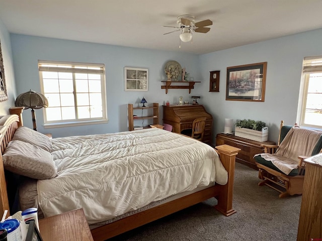 carpeted bedroom featuring a ceiling fan