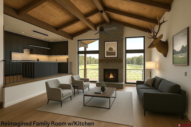206 Pines Club Pl, Pagosa Springs, CO 81147 - living room with wooden ceiling with exposed beams, wood finished floors, a ceiling fan, a brick fireplace, and high vaulted ceiling
