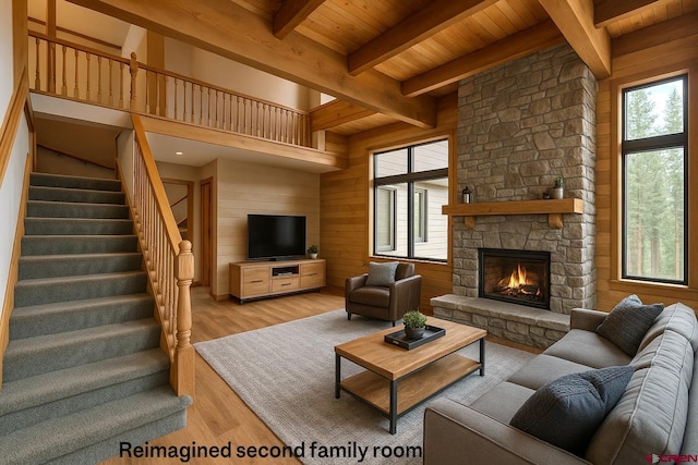 206 Pines Club Pl, Pagosa Springs, CO 81147 - living room featuring wood ceiling with exposed beams, light wood finished floors, stairway, wooden walls, and a fireplace