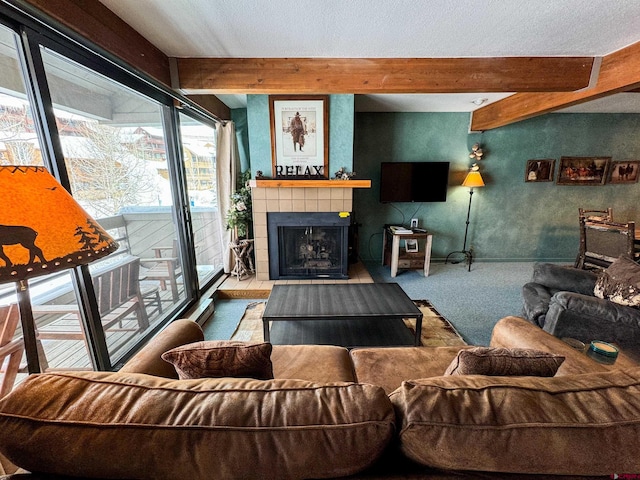 living room featuring carpet floors, a fireplace, and beam ceiling