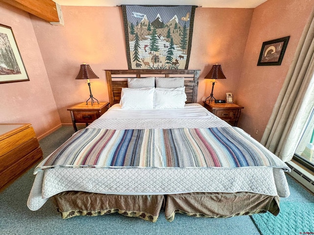 bedroom with carpet flooring and baseboards