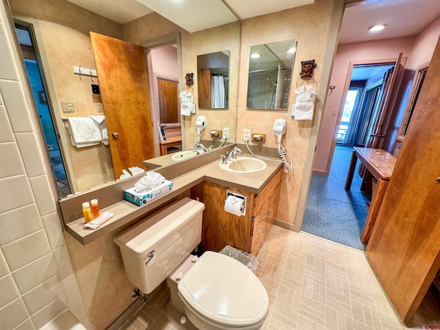 full bath with toilet and vanity