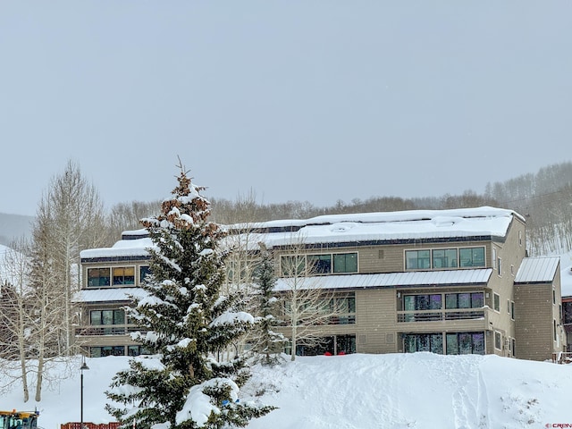 view of snow covered building