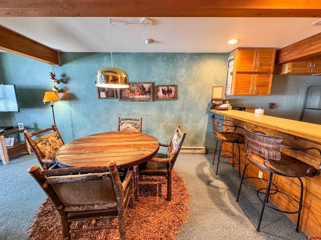 carpeted dining area featuring a bar, beam ceiling, and recessed lighting