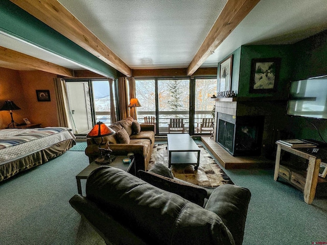 interior space with a fireplace with raised hearth and beam ceiling