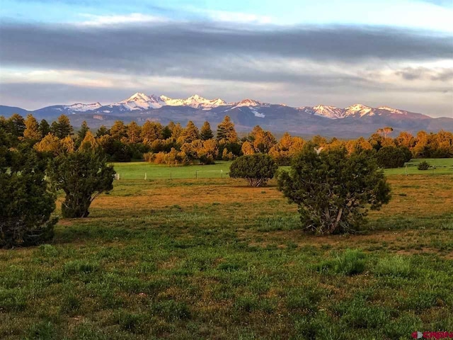 view of mountain feature with a rural view