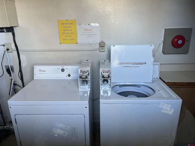 common laundry area with washer and dryer