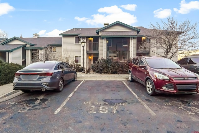 view of front of home with uncovered parking