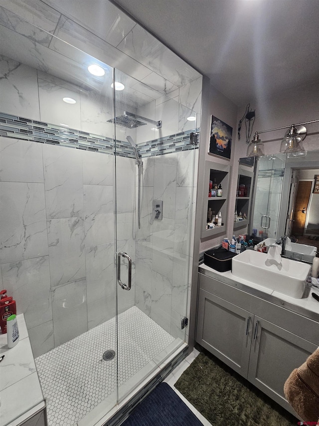 full bath featuring a shower stall and vanity