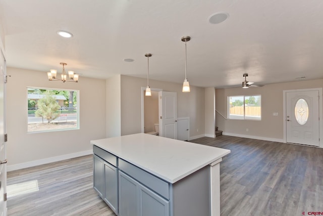 670 Nuvue St Cyprus Floorplan, Cyprus Floorplan, Delta, CO 81416 - kitchen featuring a chandelier, light countertops, light wood finished floors, a kitchen island, and recessed lighting