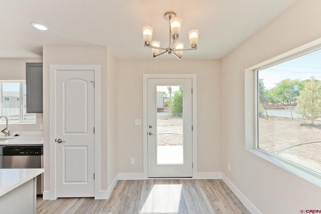 670 Nuvue St Cyprus Floorplan, Cyprus Floorplan, Delta, CO 81416 - foyer entrance featuring a chandelier, light wood-style floors, and recessed lighting