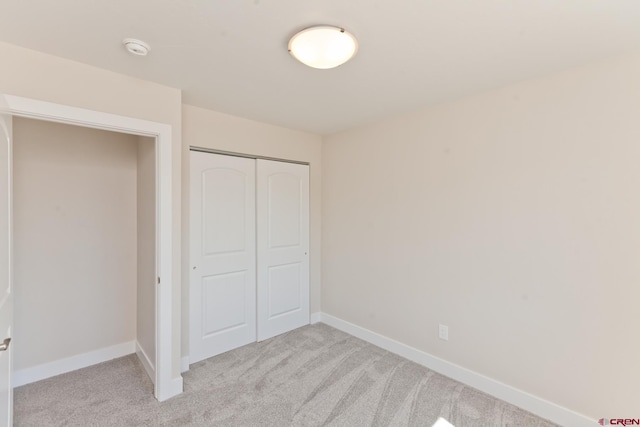 670 Nuvue St Cyprus Floorplan, Cyprus Floorplan, Delta, CO 81416 - unfurnished bedroom with light carpet and a closet