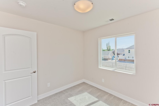 670 Nuvue St Cyprus Floorplan, Cyprus Floorplan, Delta, CO 81416 - unfurnished room featuring light colored carpet and a smoke detector