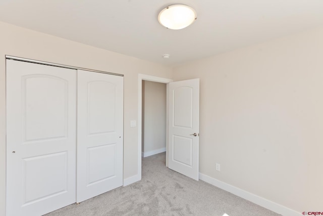 670 Nuvue St Cyprus Floorplan, Cyprus Floorplan, Delta, CO 81416 - unfurnished bedroom featuring light colored carpet and a closet