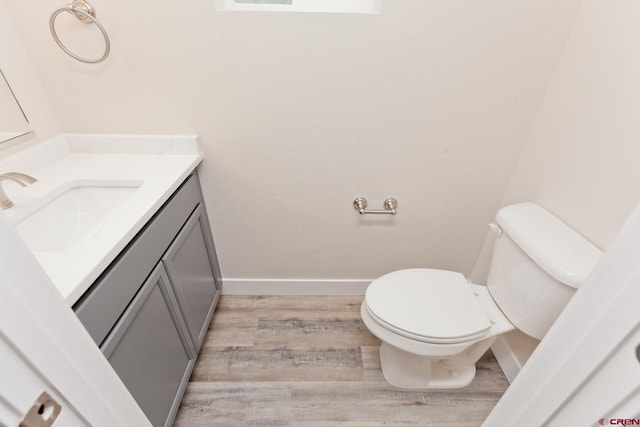 670 Nuvue St Cyprus Floorplan, Cyprus Floorplan, Delta, CO 81416 - half bathroom featuring vanity and wood finished floors