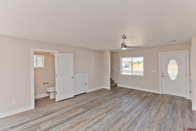 670 Nuvue St Cyprus Floorplan, Cyprus Floorplan, Delta, CO 81416 - foyer entrance featuring ceiling fan, light wood finished floors, and stairway