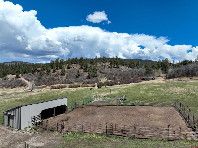 250 Sunset Ln, Durango, CO 81301 - exterior space featuring an enclosed area, a rural view, an outbuilding, and an exterior structure