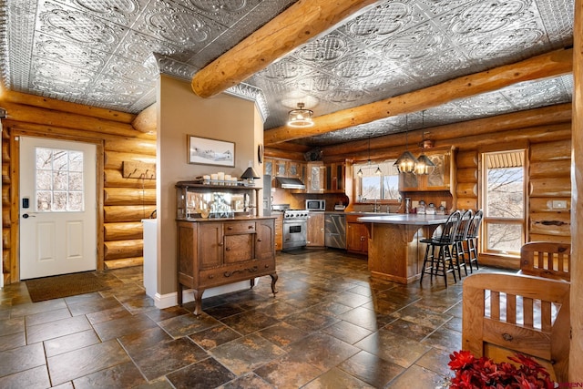 kitchen with stainless steel appliances, open shelves, an ornate ceiling, and brown cabinets