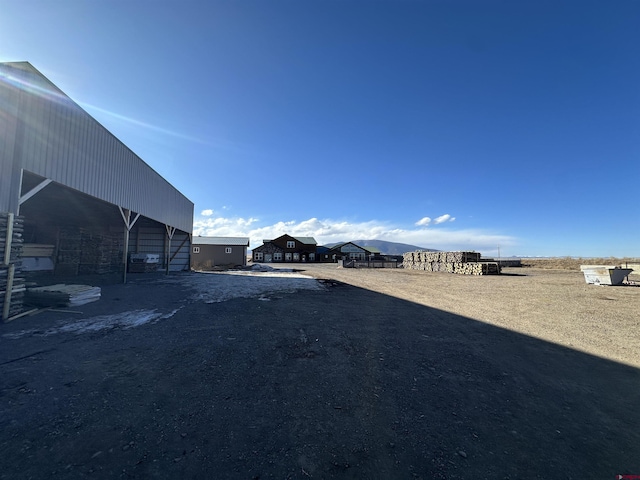 view of yard with an outbuilding and an exterior structure