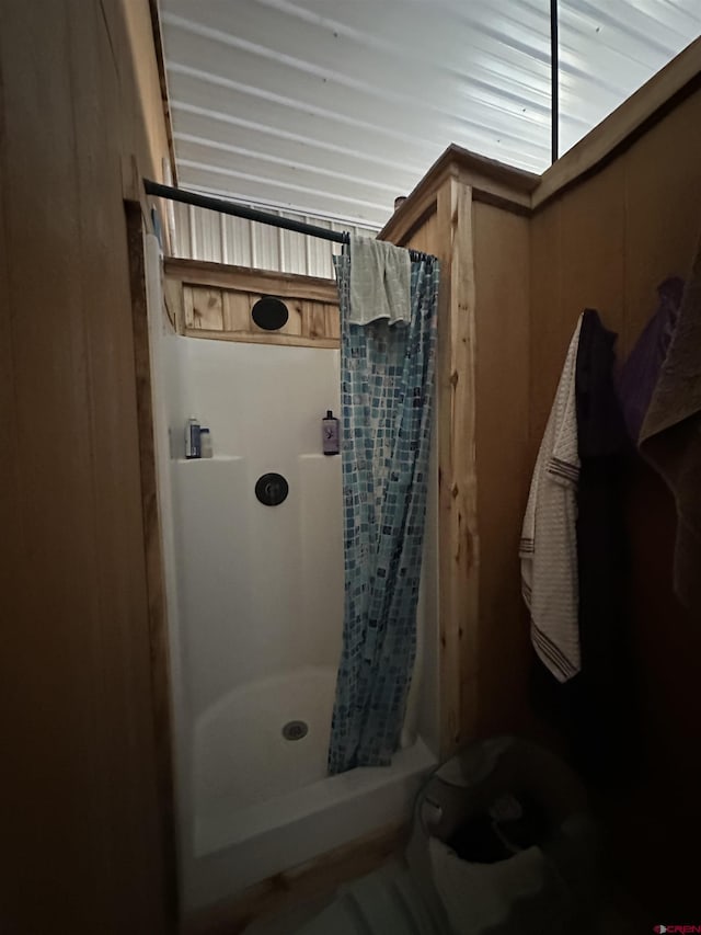 bathroom featuring a stall shower