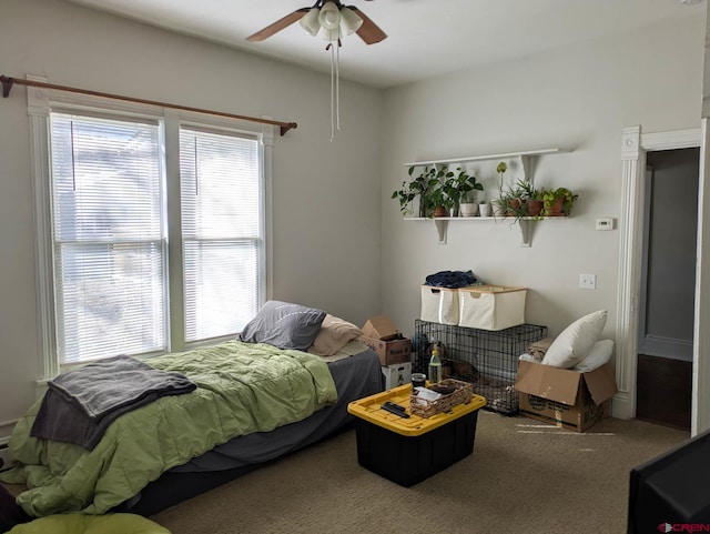 bedroom featuring carpet floors and a ceiling fan