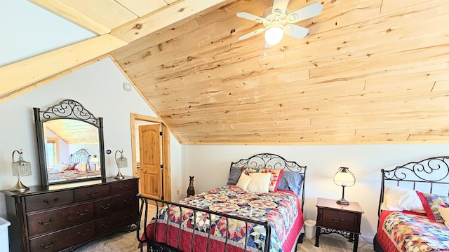 bedroom featuring vaulted ceiling, wood ceiling, and light colored carpet