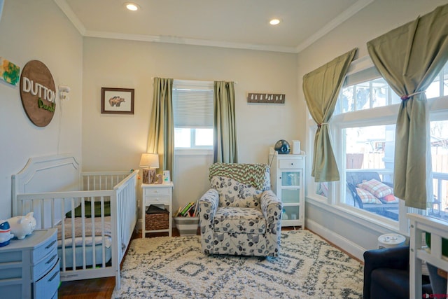 bedroom with baseboards, ornamental molding, wood finished floors, and recessed lighting