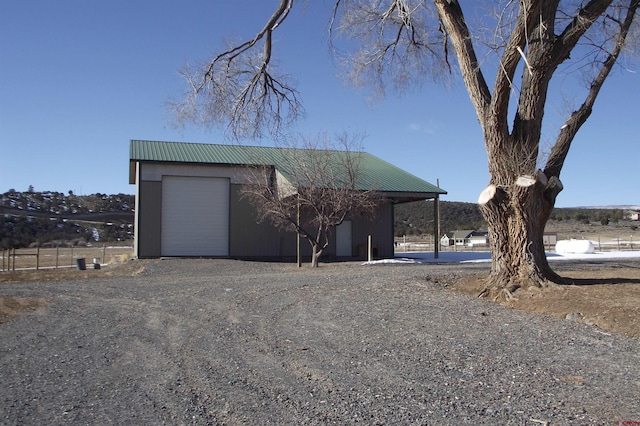 exterior space featuring an outbuilding