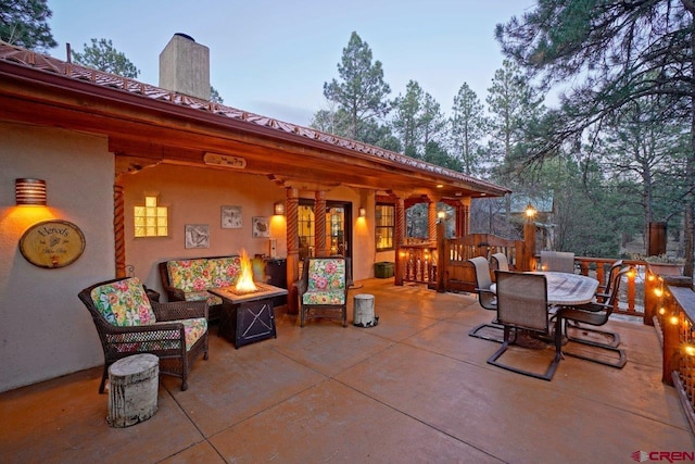 380 Marmot Dr, Ridgway, CO 81432 - view of patio / terrace with a fire pit and outdoor dining space