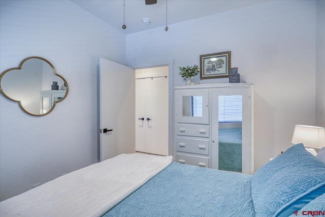 bedroom featuring vaulted ceiling