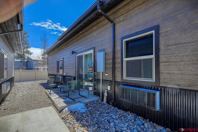 exterior space with a patio area and fence