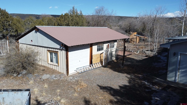 exterior space featuring a garage