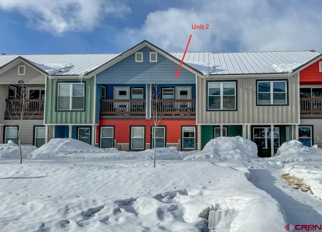 view of front of house featuring metal roof and board and batten siding