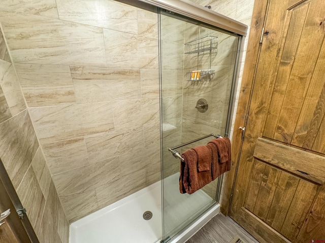 bathroom featuring a stall shower