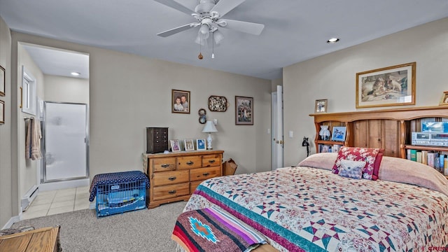 tiled bedroom featuring a ceiling fan, carpet, and baseboard heating