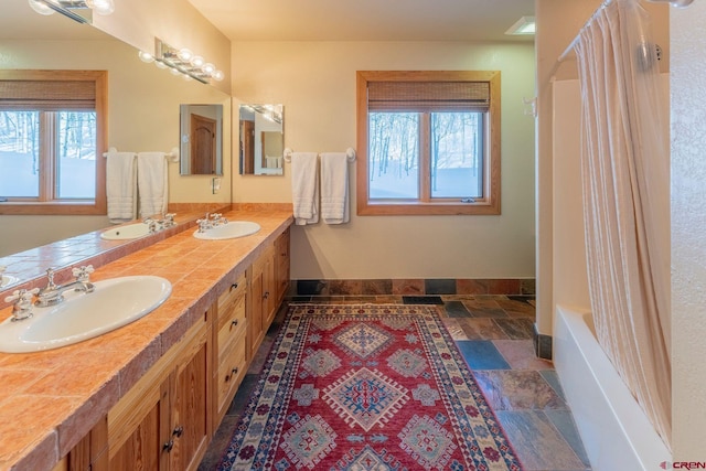 783 Forest Ln, Crested Butte, CO 81224 - bathroom featuring plenty of natural light and a sink