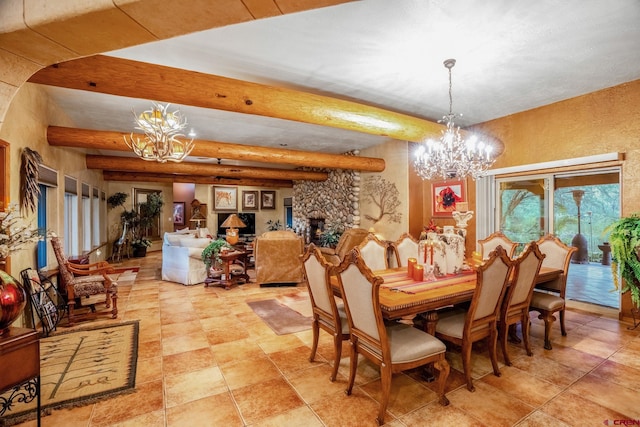 dining space featuring a fireplace, a chandelier, and beam ceiling