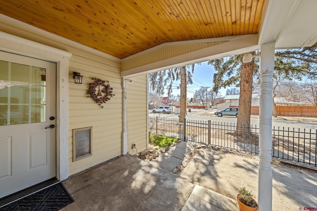 view of patio featuring fence