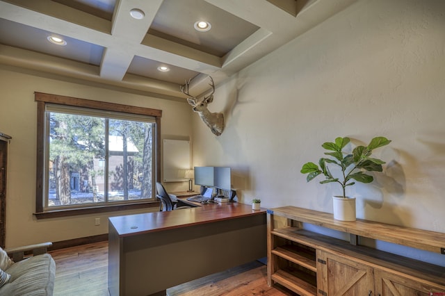 home office featuring recessed lighting, coffered ceiling, baseboards, beam ceiling, and wood-type flooring