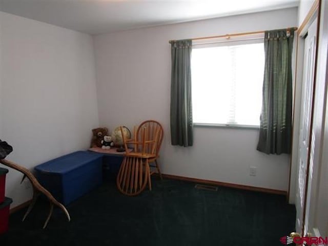 bedroom featuring baseboards