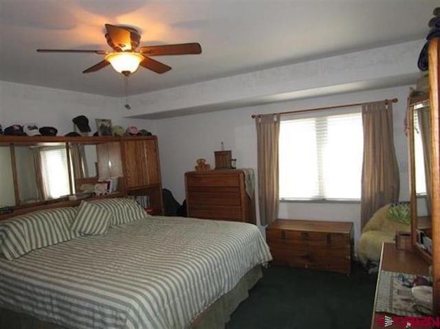 bedroom featuring carpet floors and ceiling fan