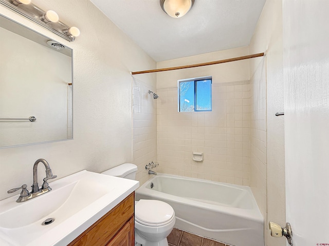 full bathroom with shower / bathing tub combination, vanity, and toilet