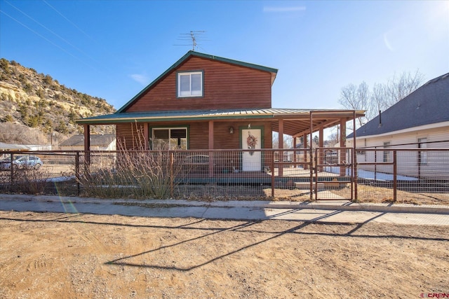 view of front of property with metal roof