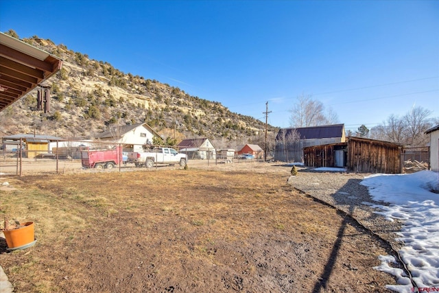 view of yard with fence