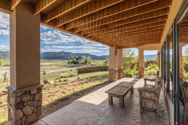 view of patio featuring a mountain view