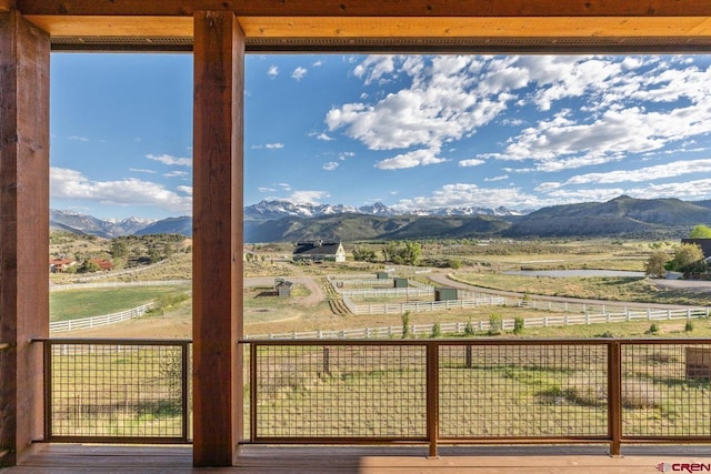 mountain view featuring a rural view