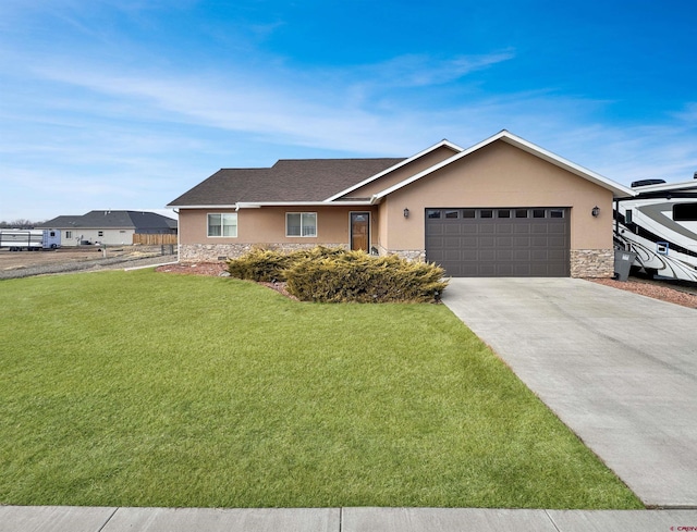 ranch-style home featuring a garage, stone siding, a front lawn, and stucco siding