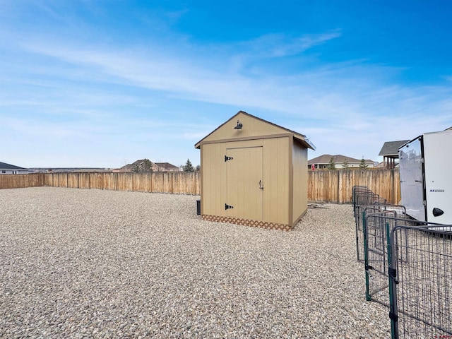 view of shed featuring a fenced backyard