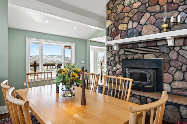 dining room featuring recessed lighting and vaulted ceiling with beams